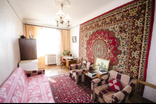 Why did they hang carpets on the wall before?