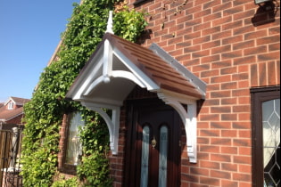How to make a visor over the porch to the house yourself?