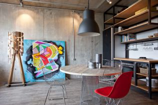 Concrete in the interior of a creative apartment of 47 sq. m.