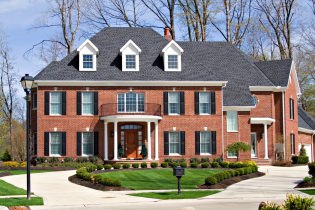 Brick facades of houses: photos, advantages and disadvantages